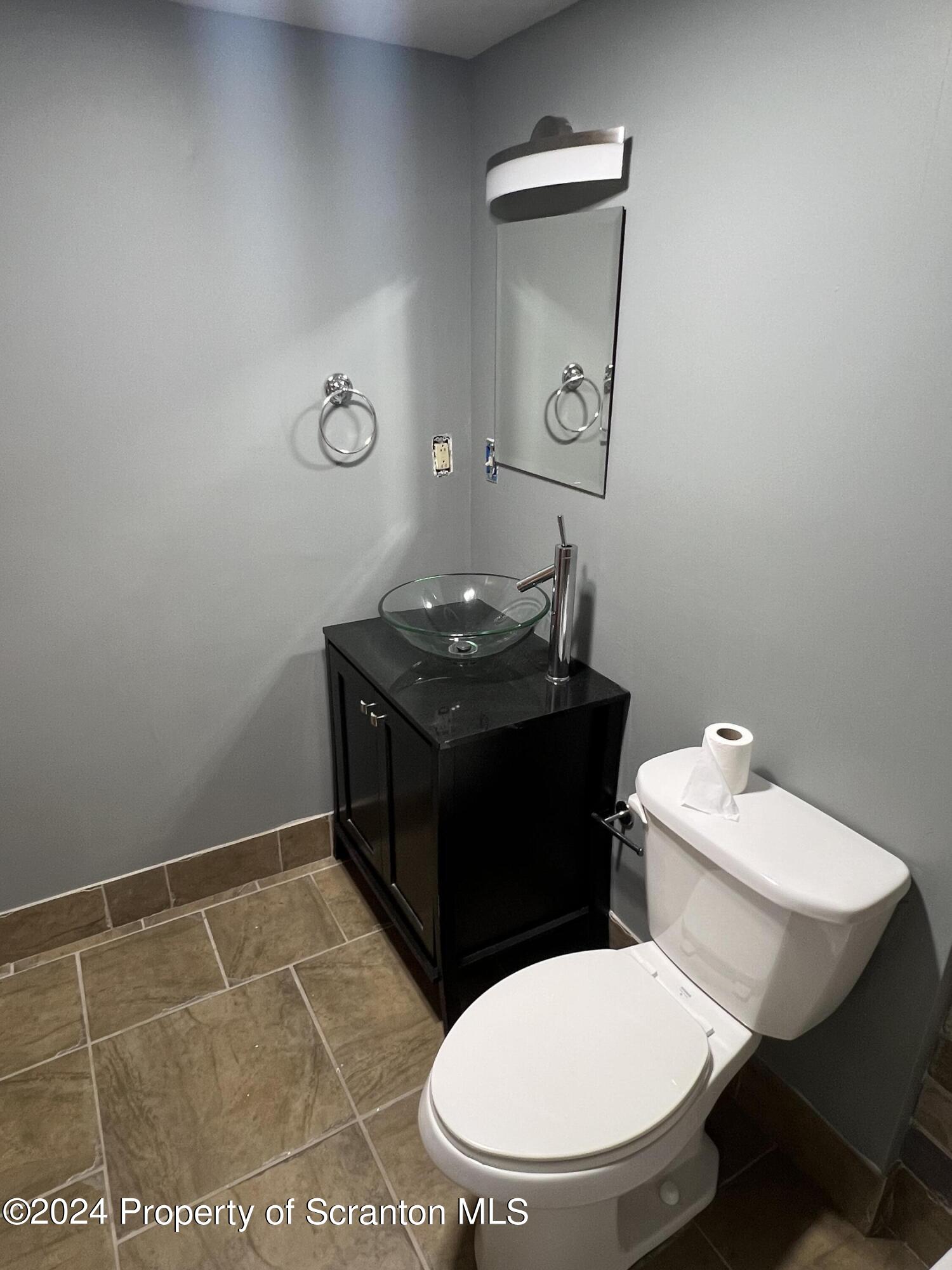 220 Linden Street, Unit 208 Scranton, PA 18503 - Photo 12 of 24 a bathroom with a toilet