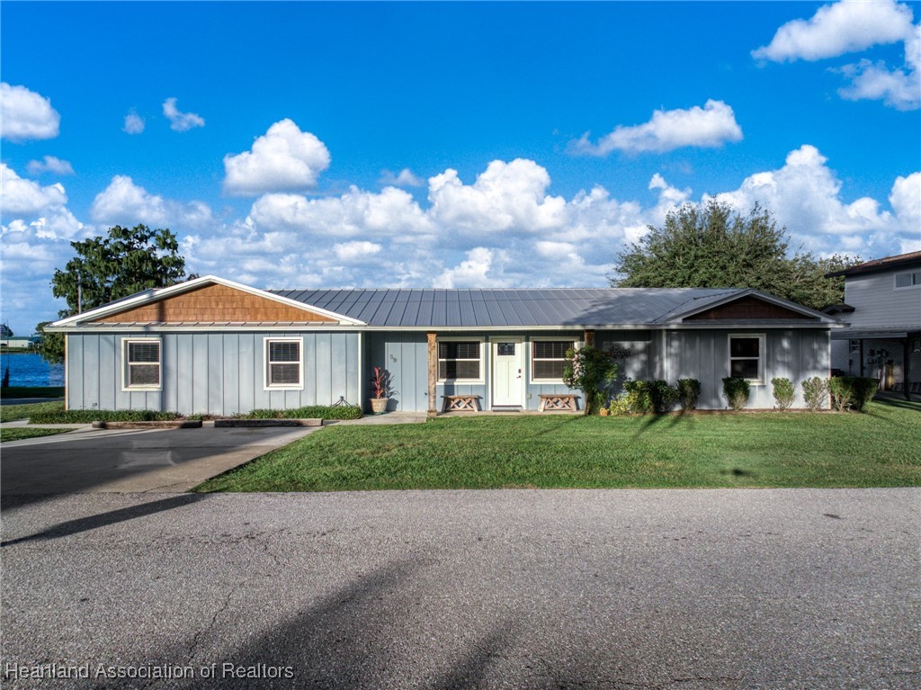 59 Twin Lakes Road Lake Placid, FL 33852 - Photo 2 of 45 4 bedrooms and 3 bathroom offer plenty of space for family and guests with over 2700 square foot of living space.
