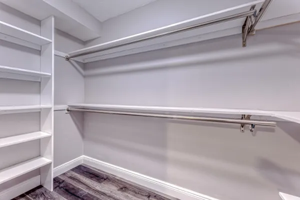 a view of an empty walk in closet
