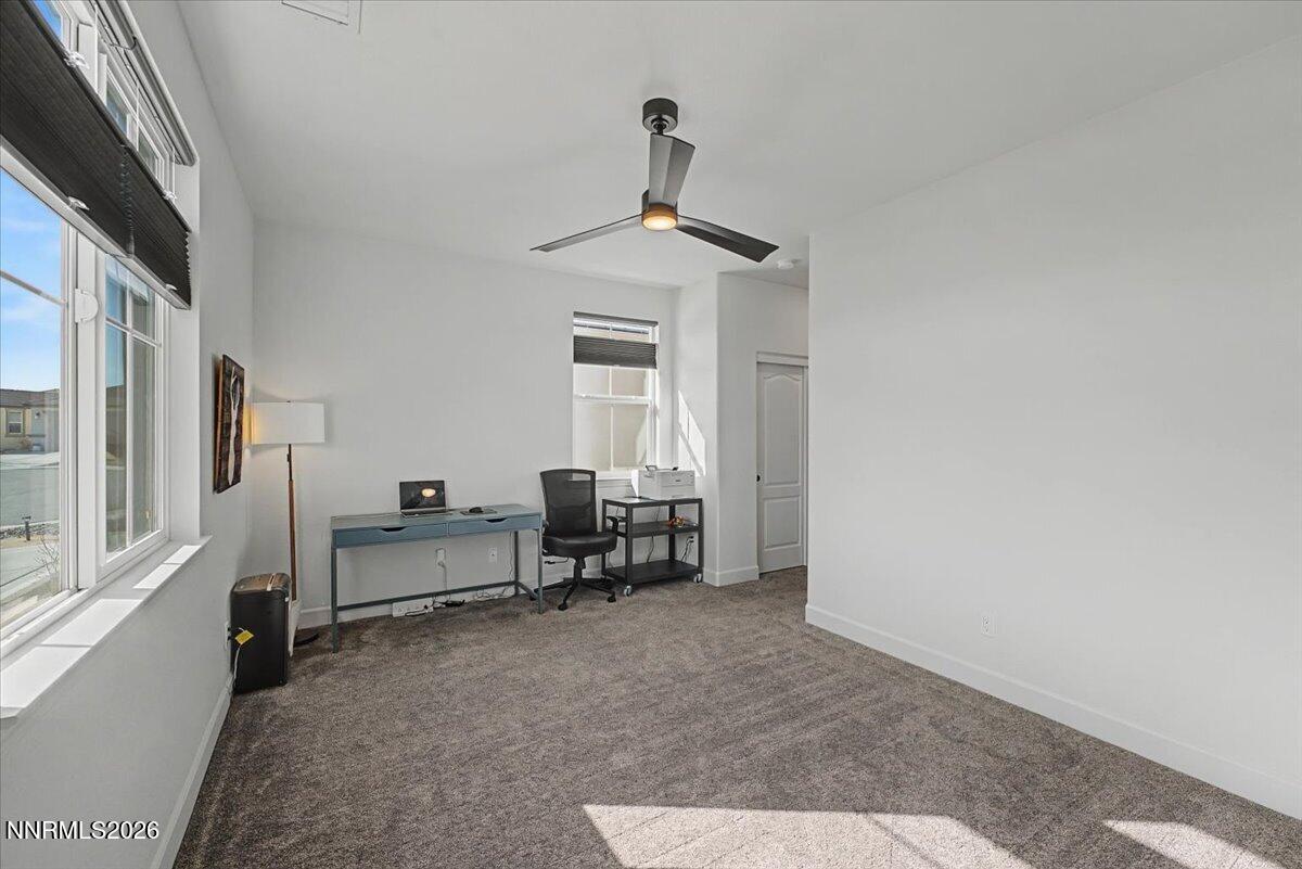 6997 Spencer Ridge Court Sparks, NV 89436 - Photo 18 of 38 a view of a livingroom with furniture and a window