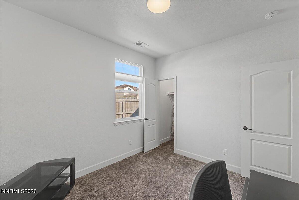 6997 Spencer Ridge Court Sparks, NV 89436 - Photo 23 of 38 a view of livingroom with hardwood