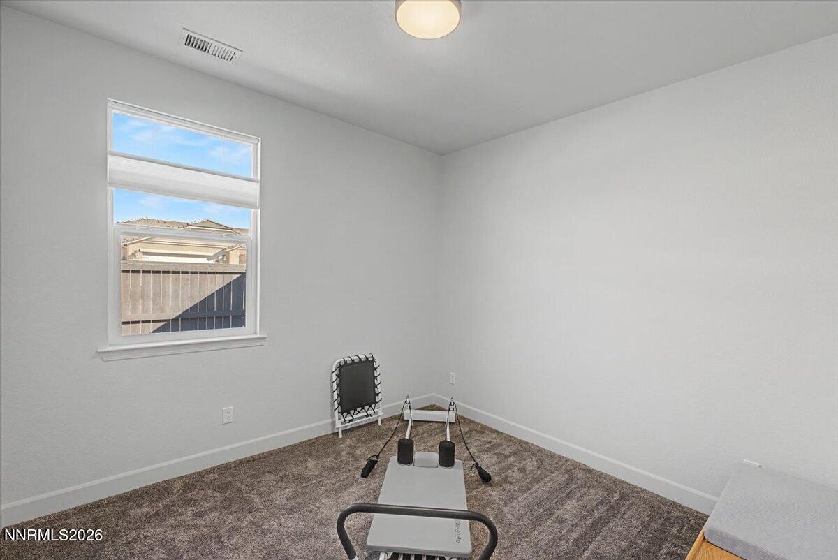 6997 Spencer Ridge Court Sparks, NV 89436 - Photo 25 of 38 a room with a window