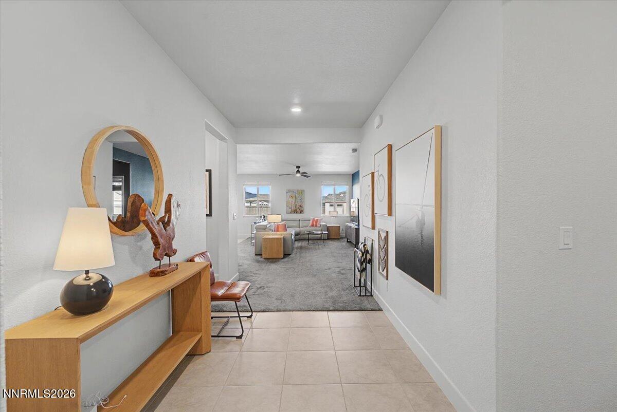 6997 Spencer Ridge Court Sparks, NV 89436 - Photo 27 of 38 a kitchen with refrigerator and tub