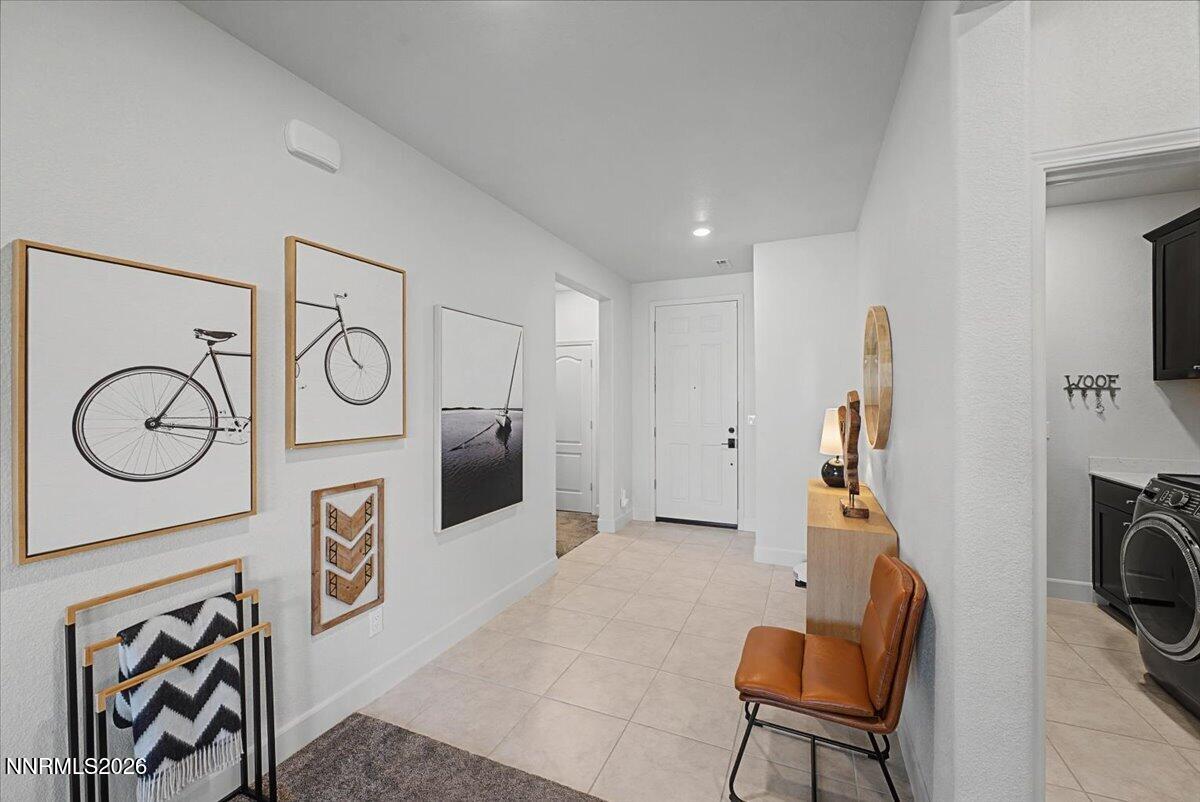 6997 Spencer Ridge Court Sparks, NV 89436 - Photo 28 of 38 a view of a livingroom with furniture and a flat screen tv