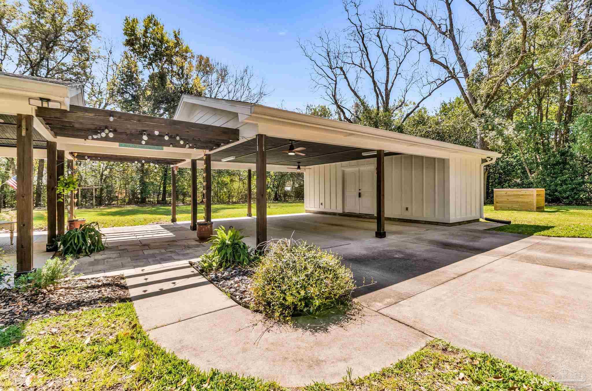 7175 Wallace Drive Pace, FL 32571 - Photo 11 of 71 a view of a backyard
