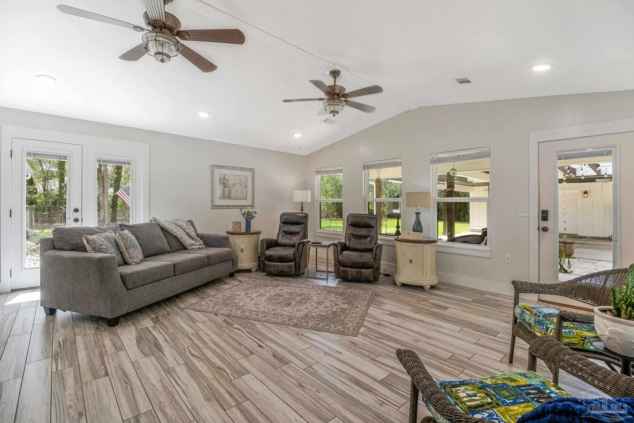 7175 Wallace Drive Pace, FL 32571 - Photo 34 of 71 a living room with furniture