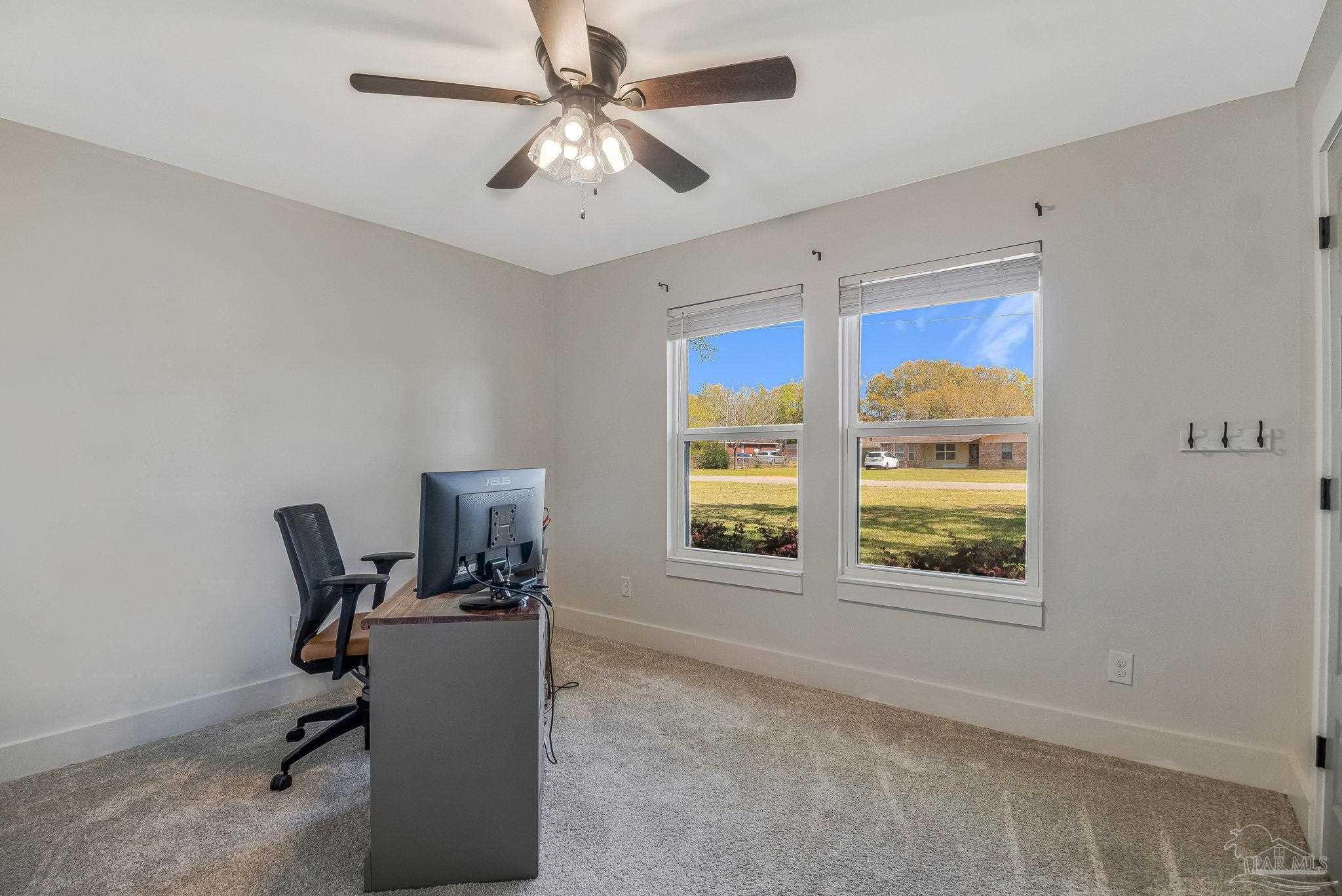 7175 Wallace Drive Pace, FL 32571 - Photo 46 of 71 a view of workspace with windows