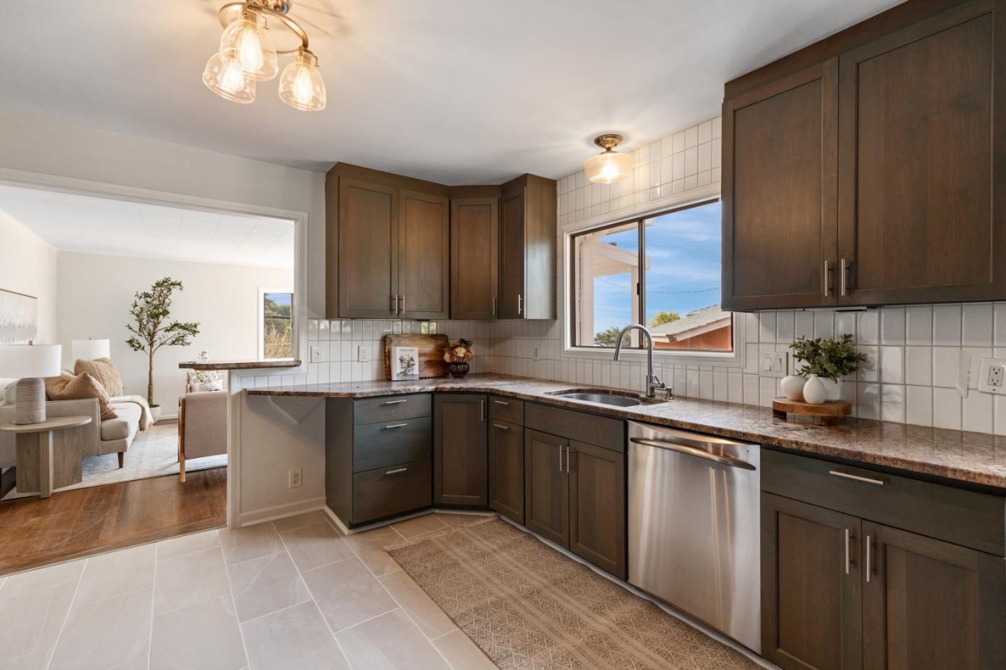 401 Monterey Road Pacifica, CA 94044 - Photo 16 of 39 a kitchen with a sink cabinets and window