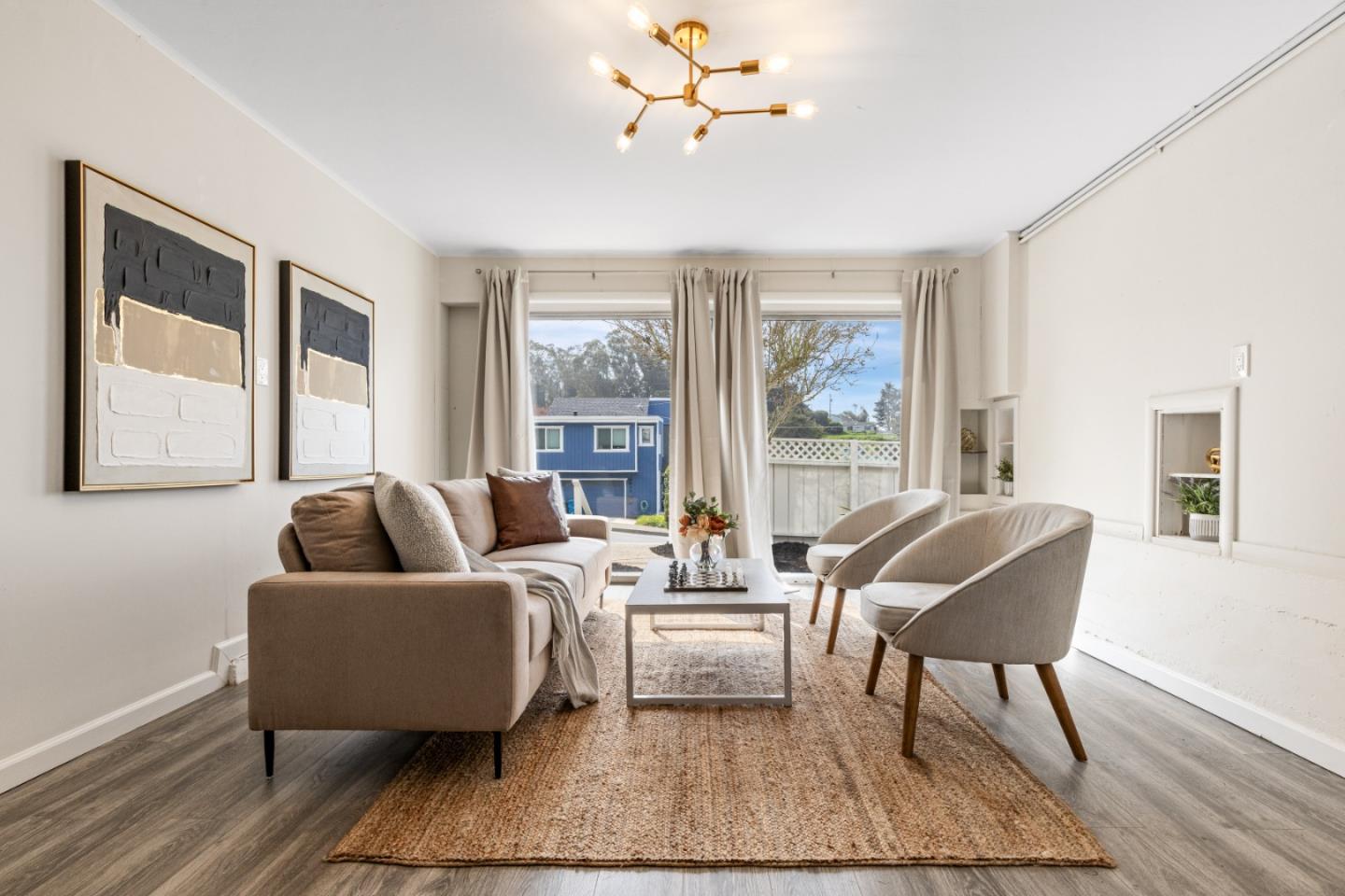401 Monterey Road Pacifica, CA 94044 - Photo 31 of 39 a living room with furniture and a large window