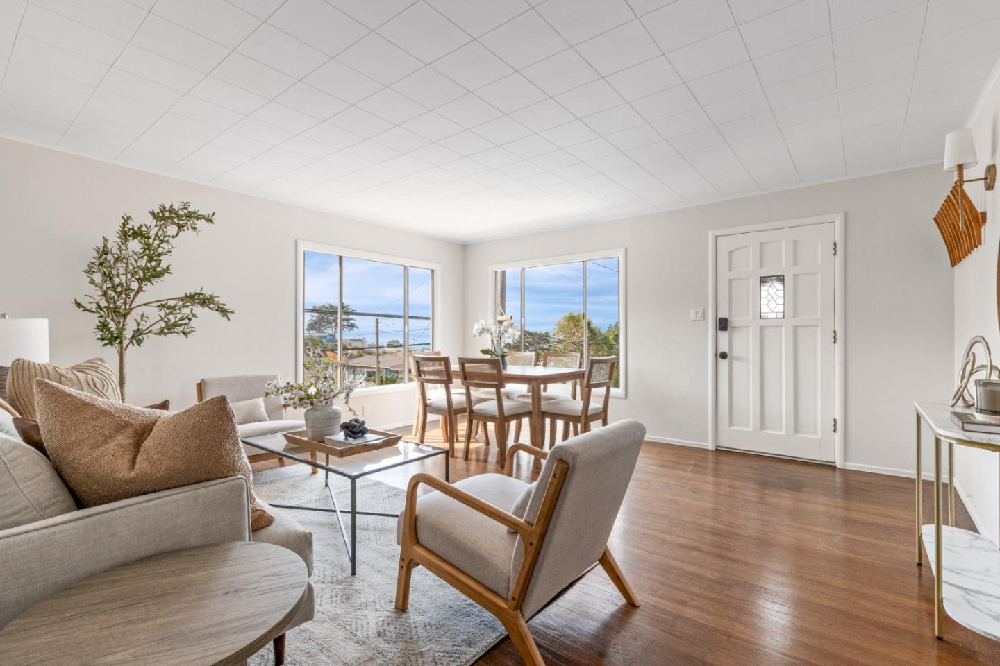 401 Monterey Road Pacifica, CA 94044 - Photo 5 of 39 a living room with furniture and a wooden floor