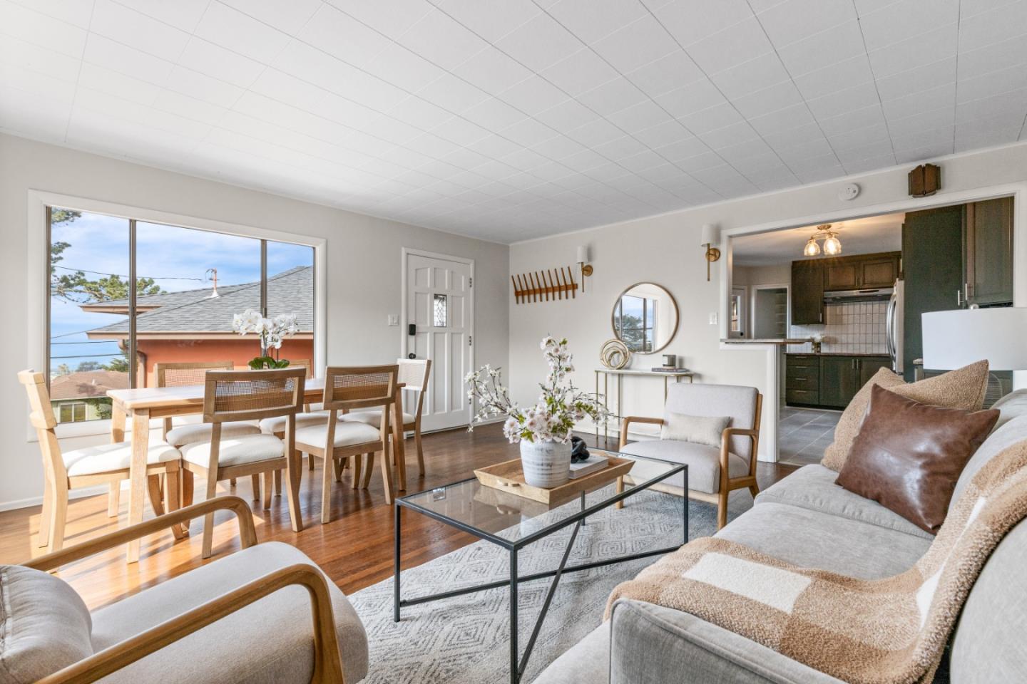 401 Monterey Road Pacifica, CA 94044 - Photo 7 of 39 a living room with furniture and a large window