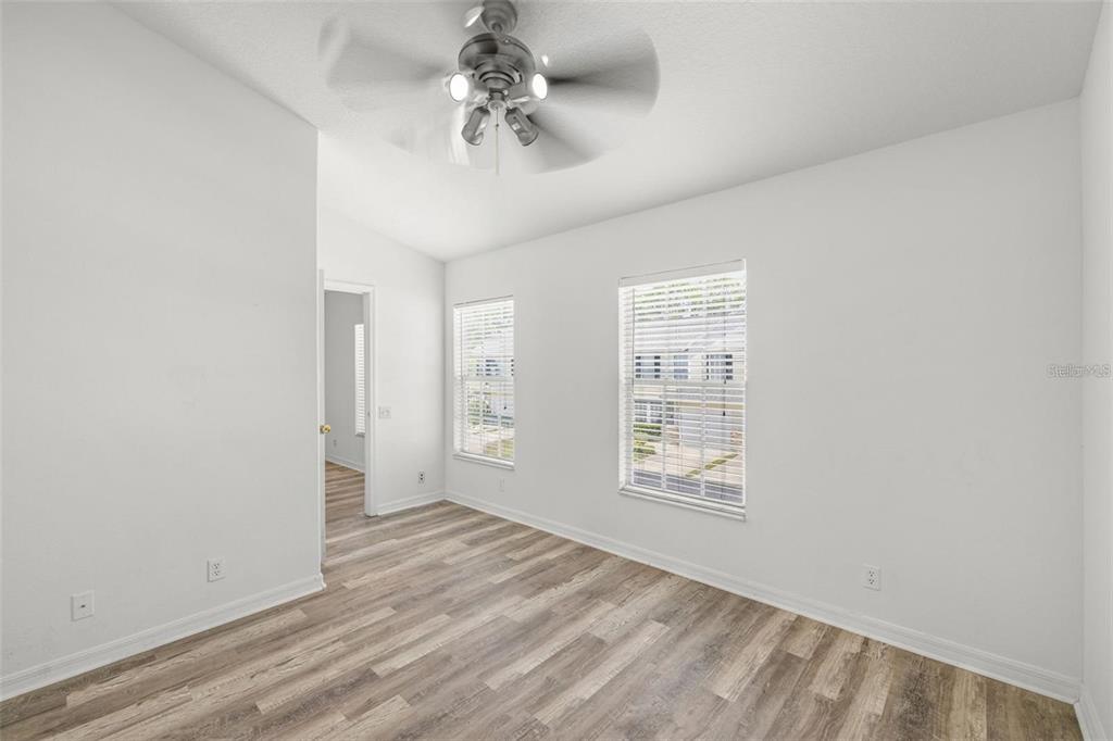 8010 Thoroughbred Loop Largo, FL 33773 - Photo 16 of 29 a view of an empty room with a window