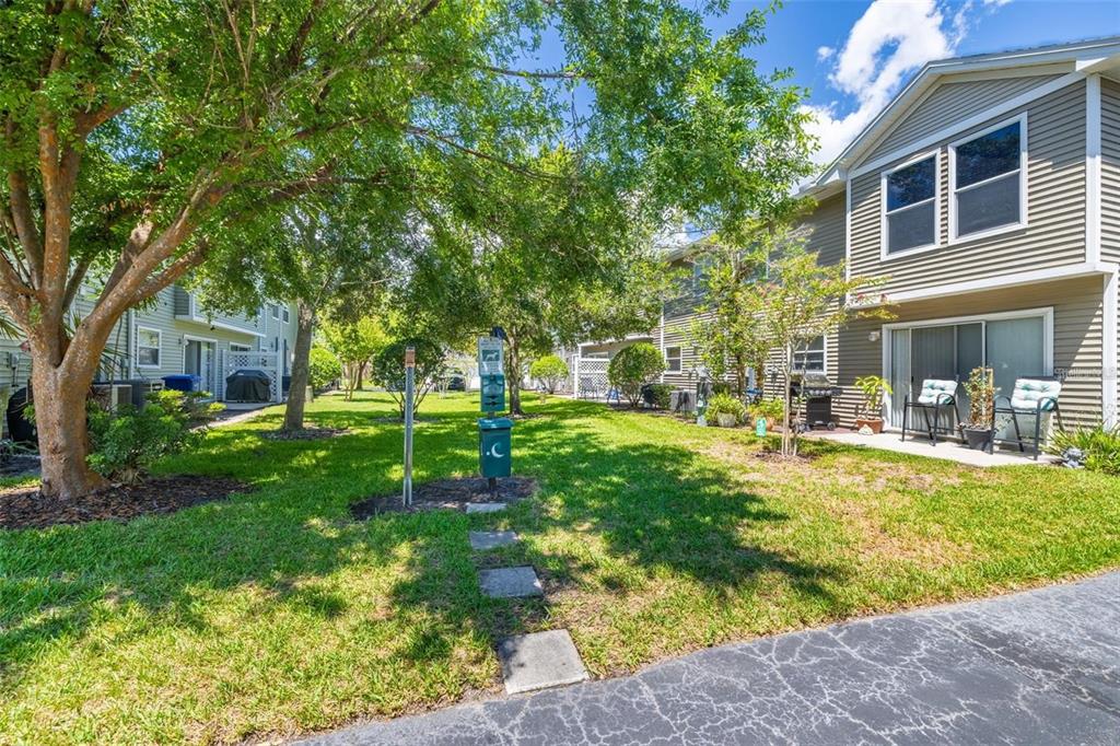 8010 Thoroughbred Loop Largo, FL 33773 - Photo 27 of 29 a view of a house with backyard and sitting area