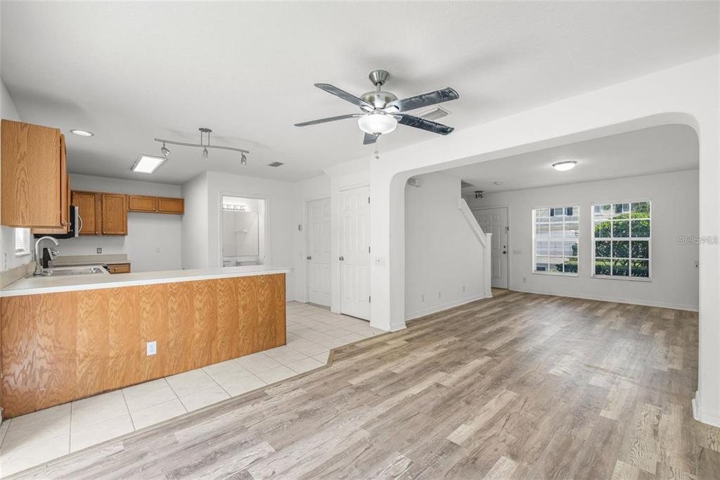 8010 Thoroughbred Loop Largo, FL 33773 - Photo 7 of 29 a view of a kitchen with a sink and a window
