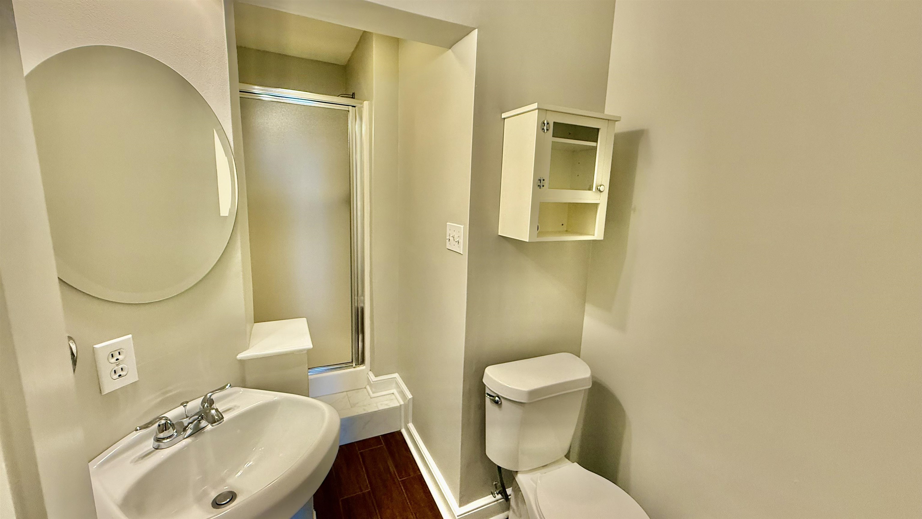 184 Marrakesh Circle Memphis, TN 38103 - Photo 11 of 34 a white toilet sitting next to a bathroom sink