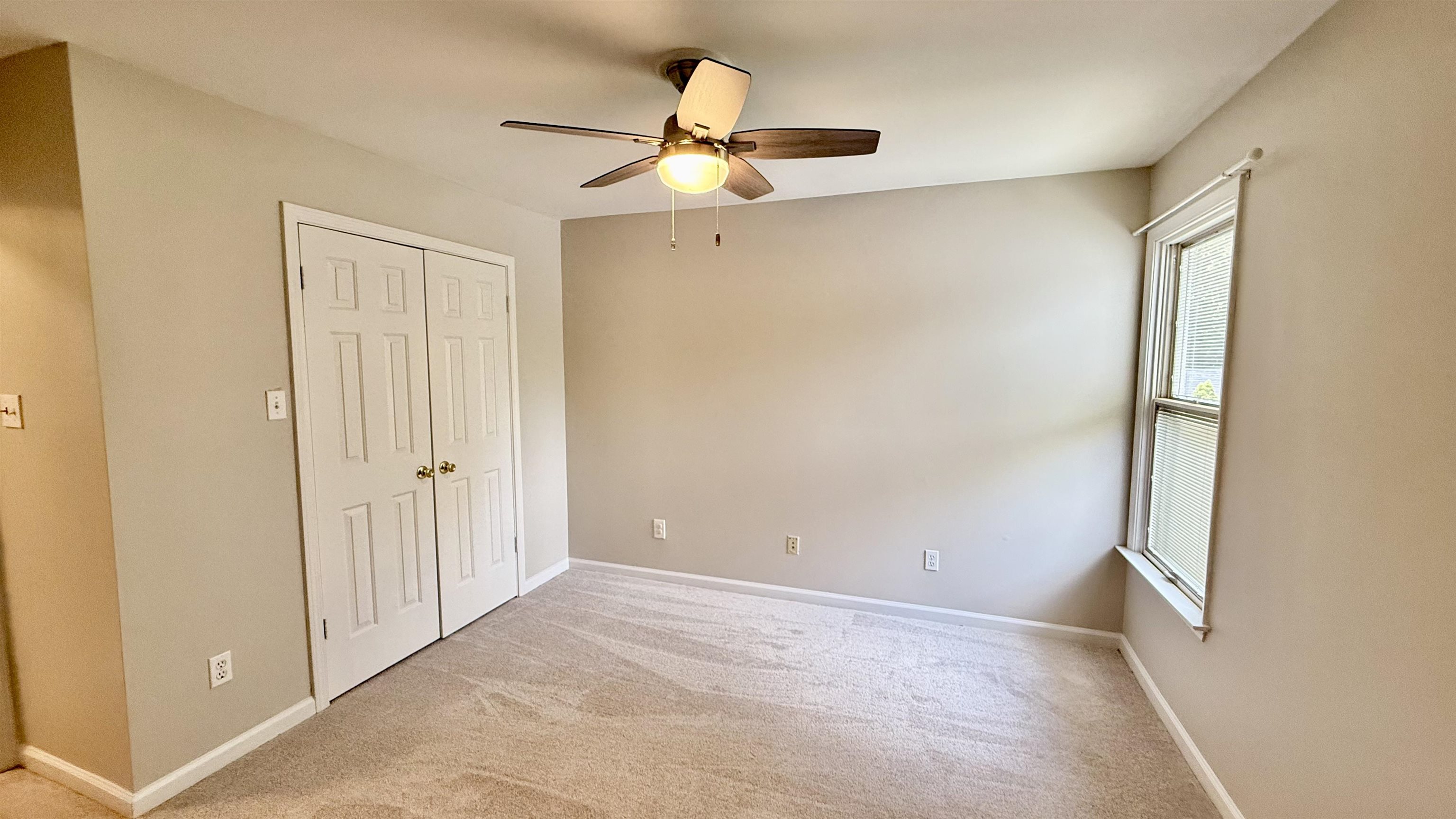 184 Marrakesh Circle Memphis, TN 38103 - Photo 20 of 34 a view of a room with a ceiling fan and window