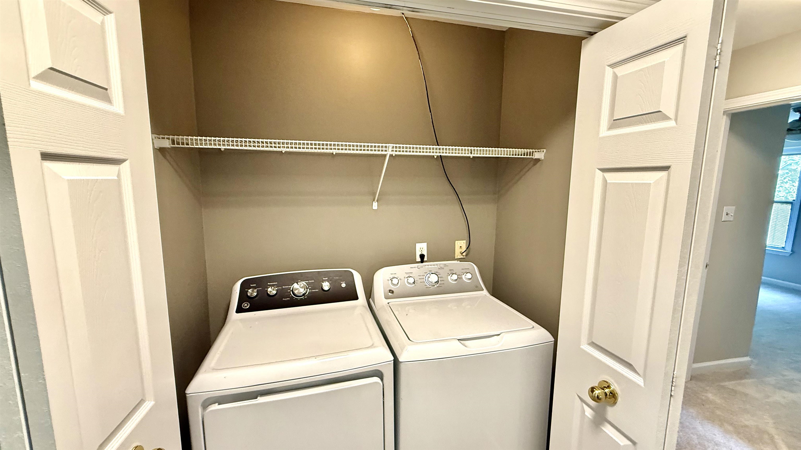 184 Marrakesh Circle Memphis, TN 38103 - Photo 24 of 34 a utility room with dryer and washer