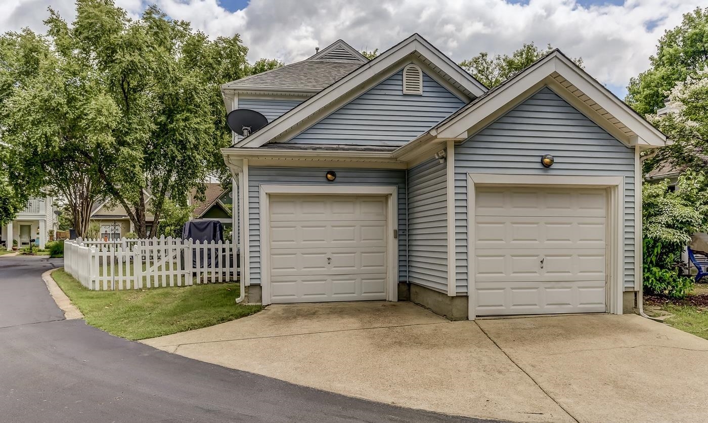 184 Marrakesh Circle Memphis, TN 38103 - Photo 30 of 34 a front view of a house with a garage