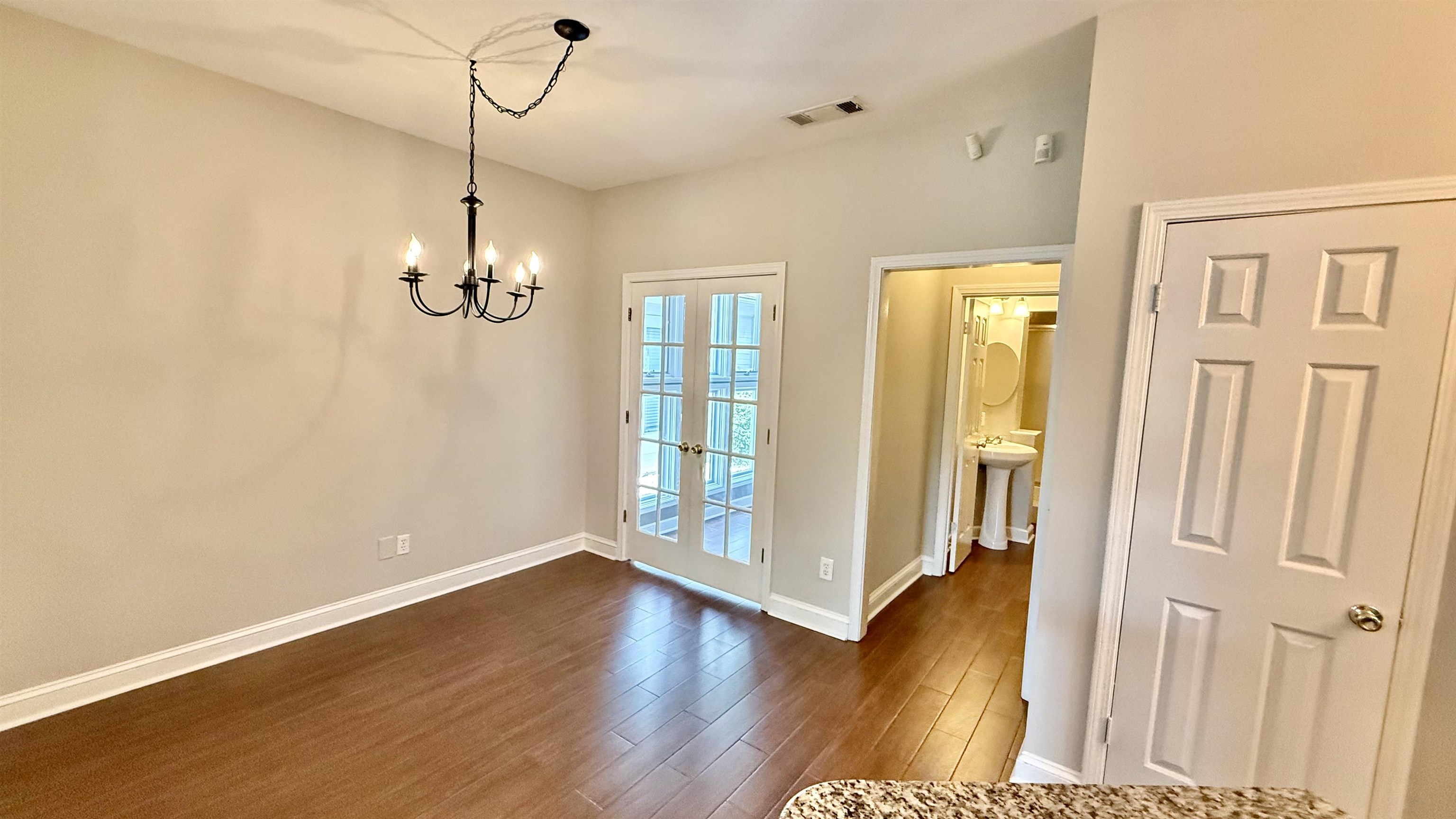 184 Marrakesh Circle Memphis, TN 38103 - Photo 7 of 34 a view of a room with wooden floor and entryway