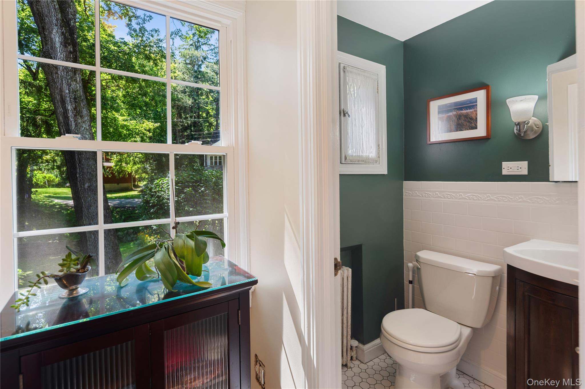 611 Decatur Avenue Peekskill, NY 10566 - Photo 28 of 50 The main floor powder room features vintage details and added conveniences for guests.