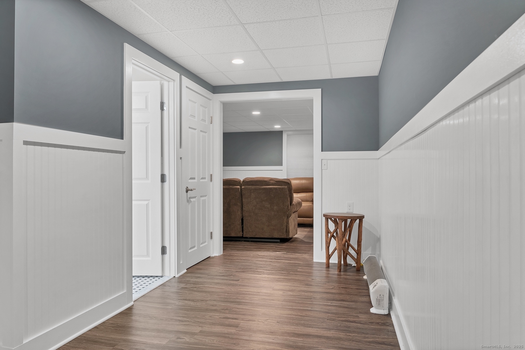 113 Flat Rock Road Branford, CT 06405 - Photo 18 of 39 a view of a hallway with wooden floor
