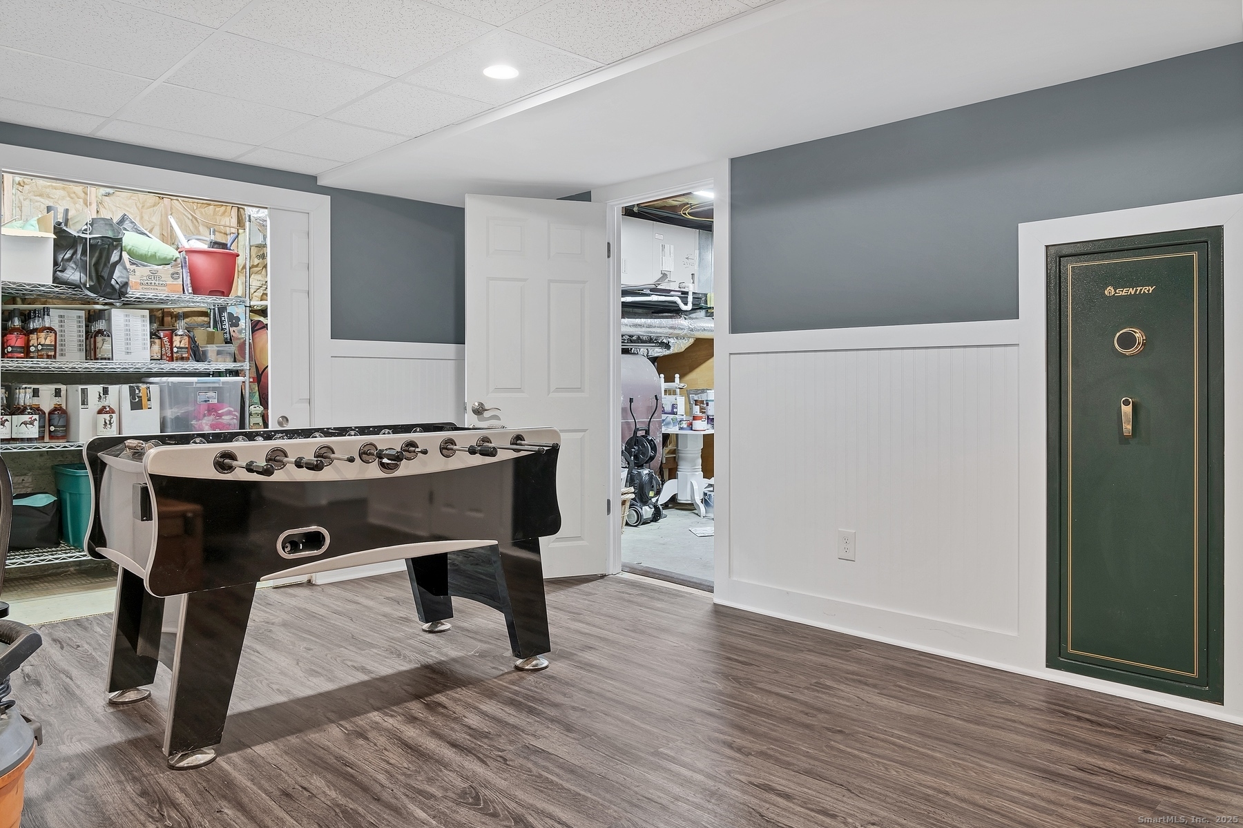 113 Flat Rock Road Branford, CT 06405 - Photo 21 of 39 a view of work space with furniture and wooden floor