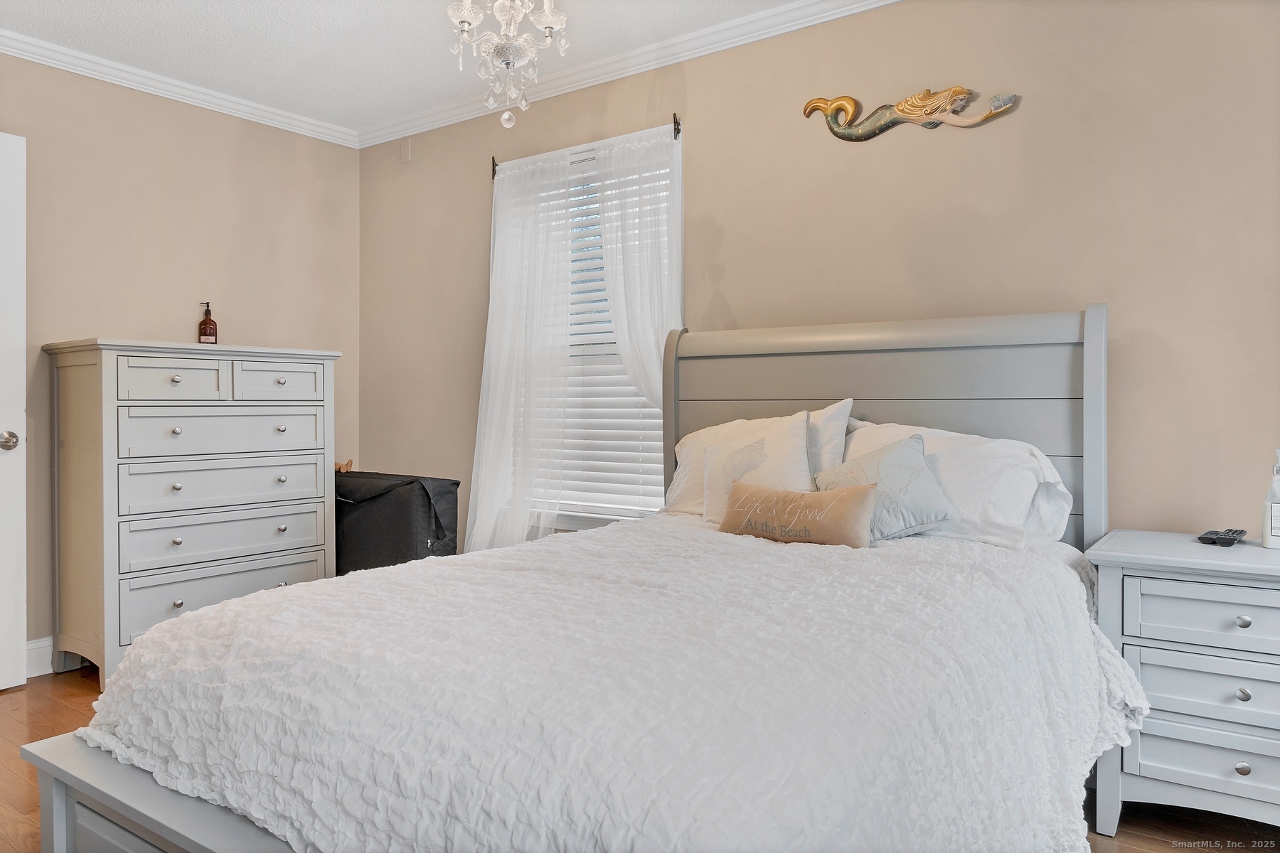 113 Flat Rock Road Branford, CT 06405 - Photo 23 of 39 a large bed sitting in a bedroom and dresser
