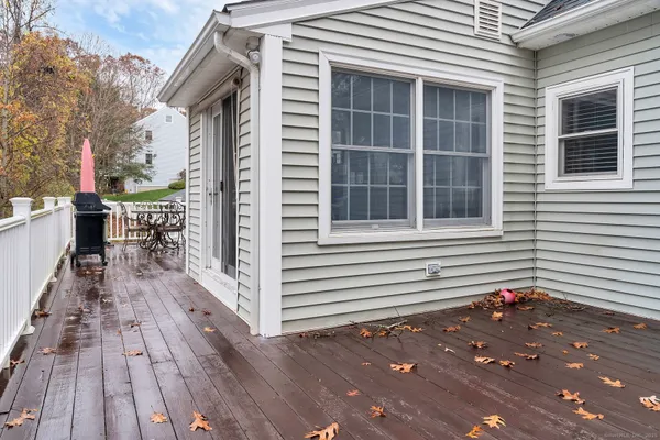 a view of a house with backyard and wooden floors