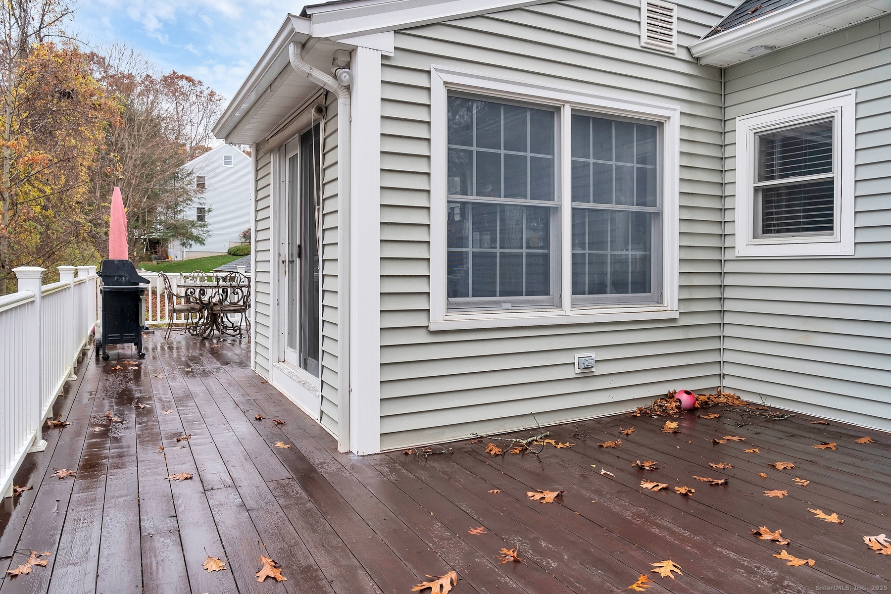 113 Flat Rock Road Branford, CT 06405 - Photo 35 of 39 a view of a house with backyard and wooden floors