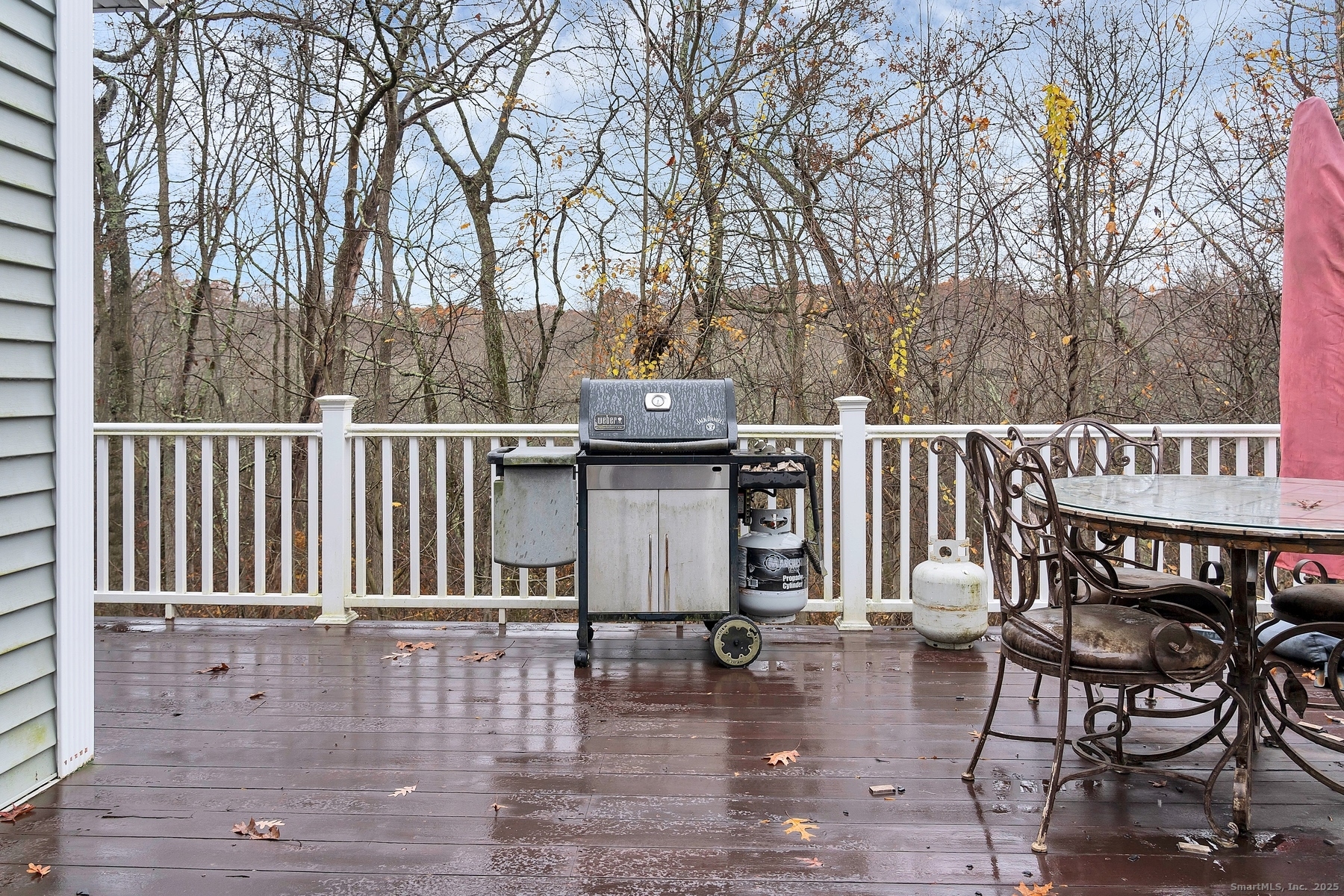 113 Flat Rock Road Branford, CT 06405 - Photo 38 of 39 a view of a chairs and table on the wooden floor