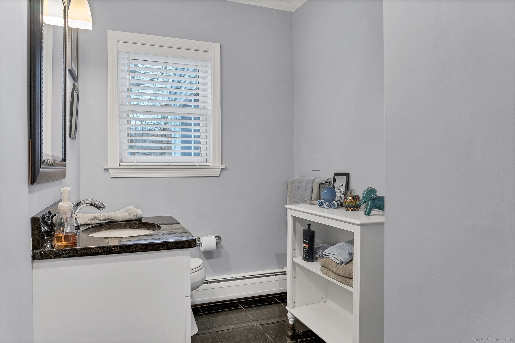 113 Flat Rock Road Branford, CT 06405 - Photo 7 of 39 a room with a window and cabinets