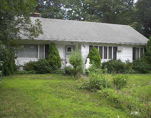 a view of a house with garden and yard