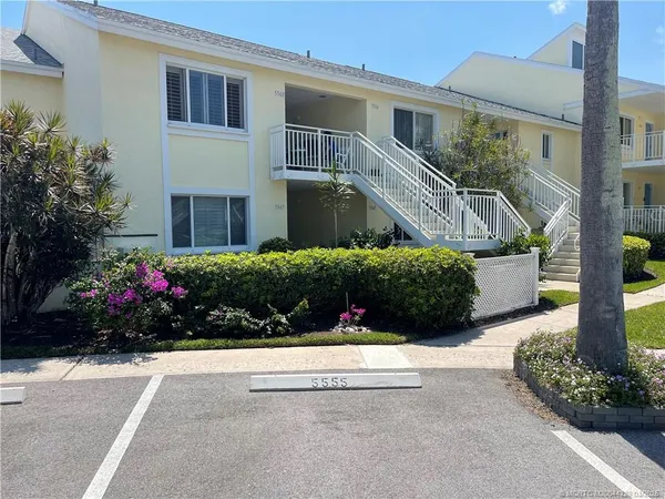 a view of a house with a garden