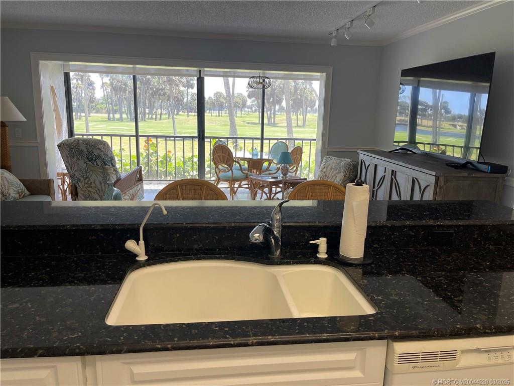 5565 Northeast Gulfstream Way Stuart, FL 34996 - Photo 9 of 21 a room with furniture and window