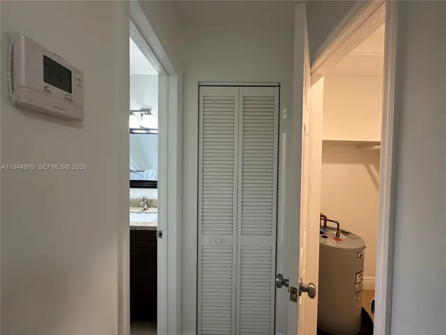 a view of a room that has a window in it