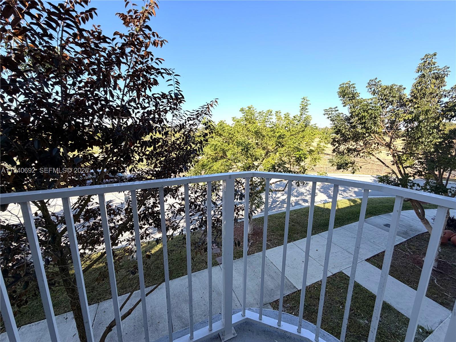 25823 Southwest 145th Avenue Miami, FL 33170 - Photo 13 of 18 a view of balcony with wooden floor