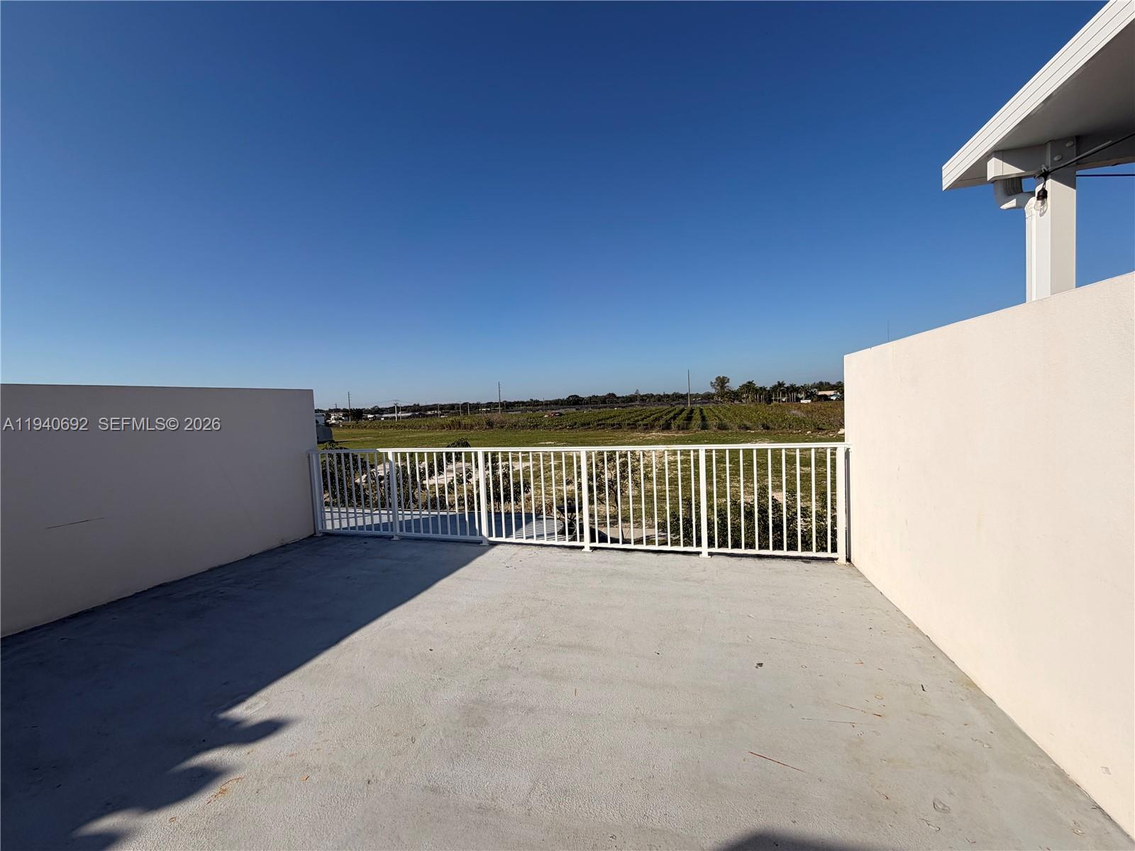 25823 Southwest 145th Avenue Miami, FL 33170 - Photo 17 of 18 a view of a balcony with city view