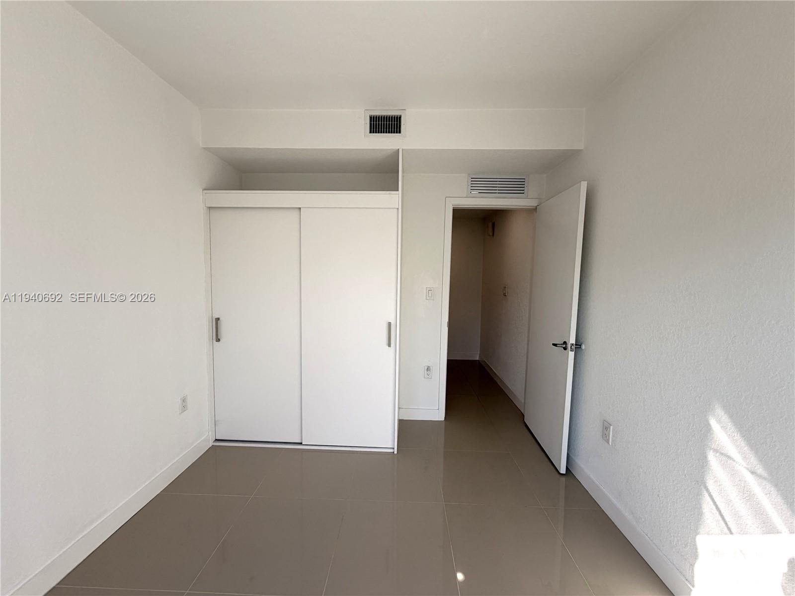 25823 Southwest 145th Avenue Miami, FL 33170 - Photo 8 of 18 a view of an empty room