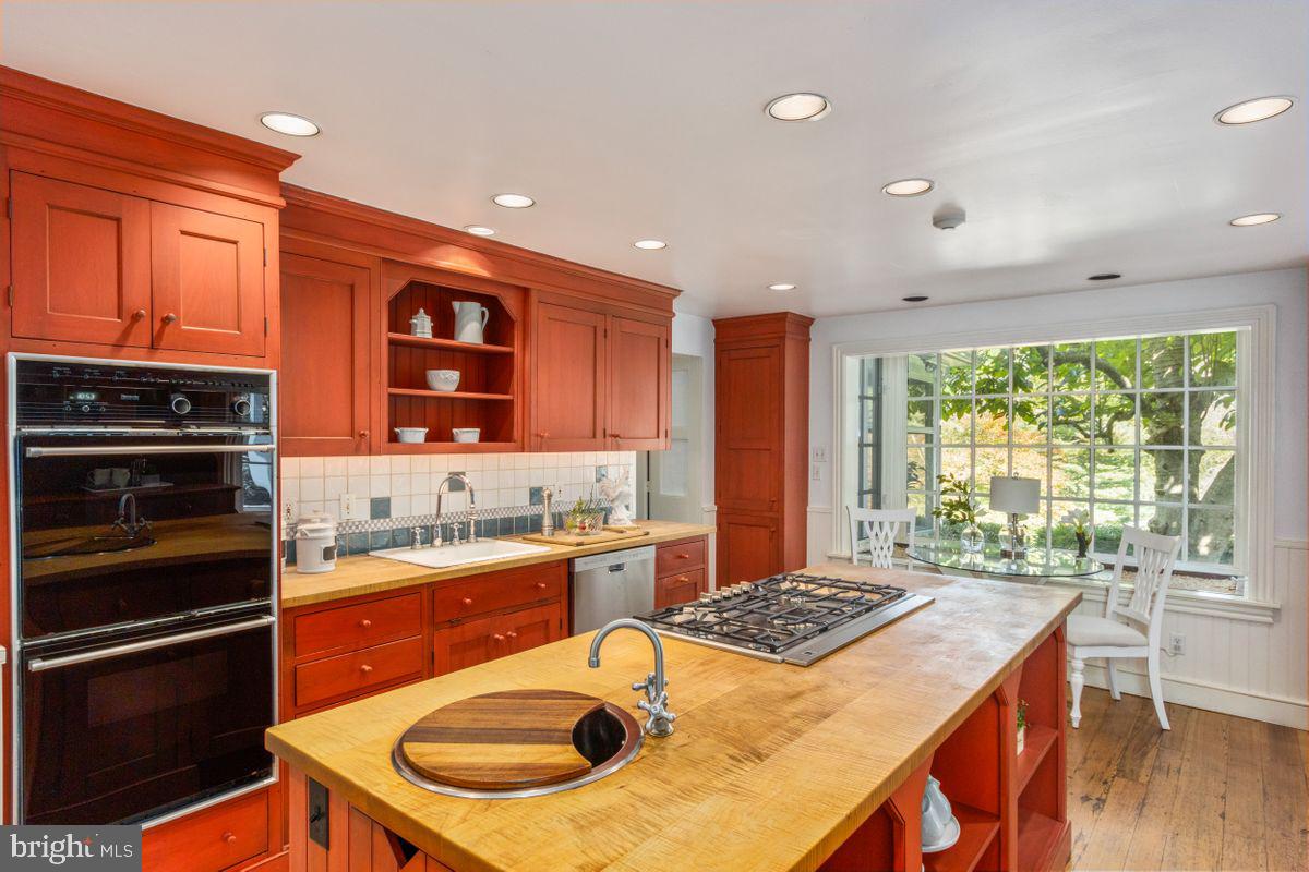 569 Conestoga Road Villanova, PA 19085 - Photo 21 of 52 Central Kitchen Island With Cooktop