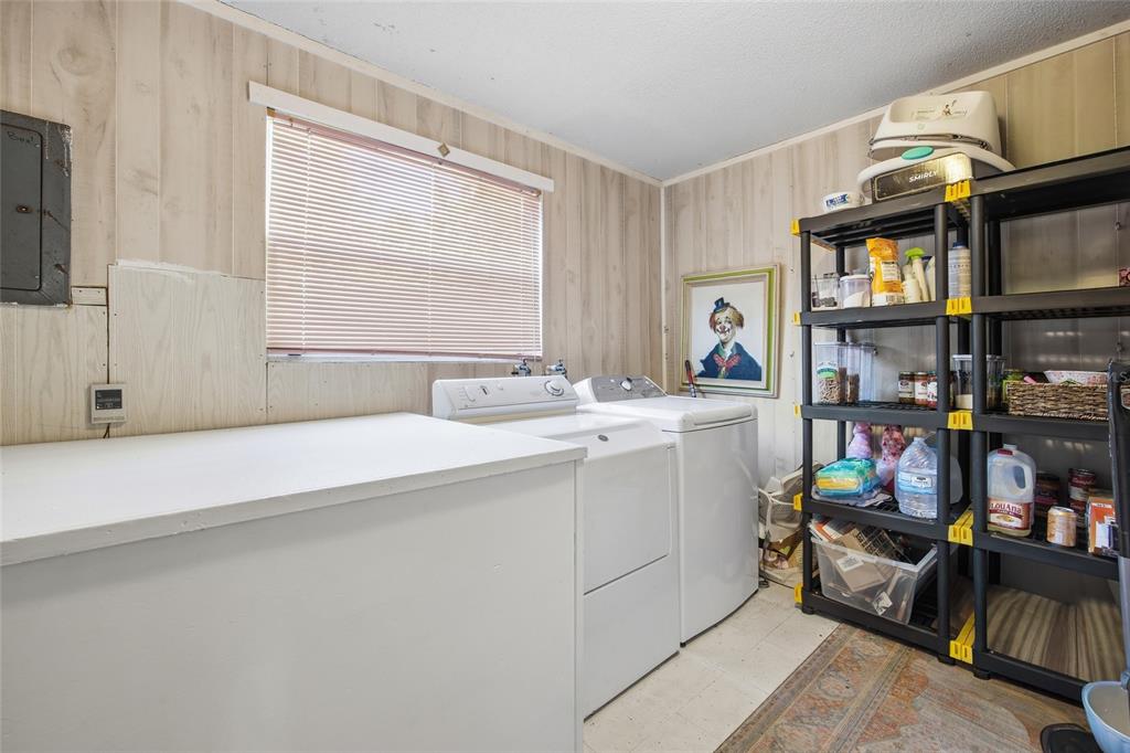 10550 Northeast 222nd Place Road Fort McCoy, FL 32134 - Photo 30 of 48 a room with storage and utility