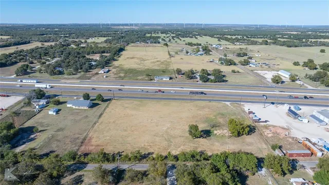an aerial view of a house with a outdoor space