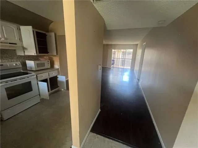 a view of kitchen and utility room