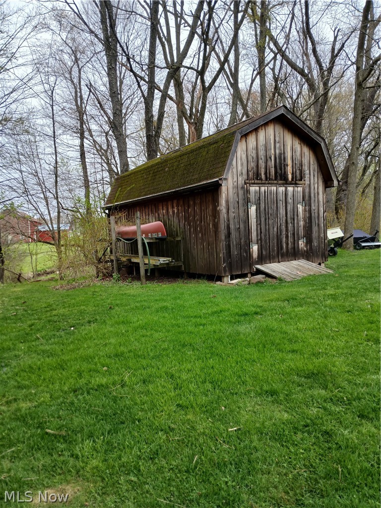 13872 Patch Road Burton, OH 44021 - Photo 32 of 33 Large shed at rear corner of property.