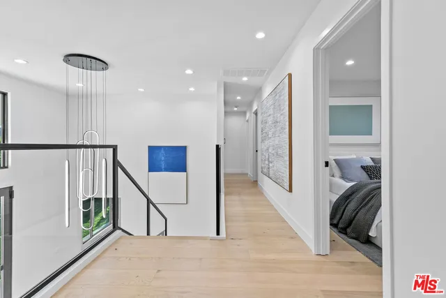 a bathroom with a shower a toilet and a sink