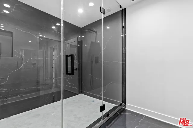 a view of balcony with furniture