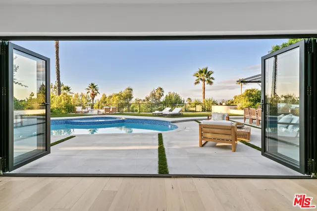 a view of a terrace with sitting area