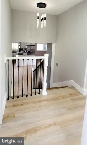 a view of a kitchen with a sink
