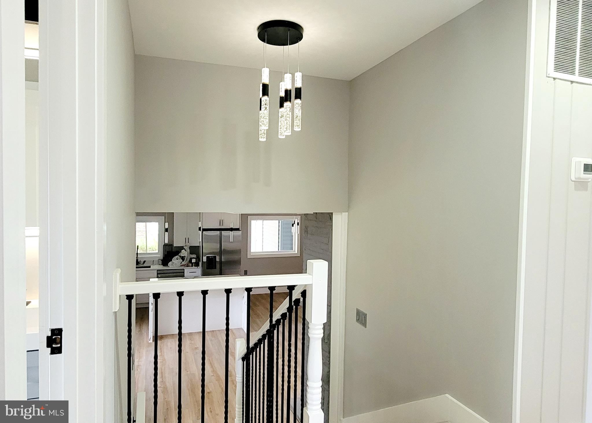 5401 Ferndale Street Springfield, VA 22151 - Photo 20 of 28 a kitchen with a sink and cabinets