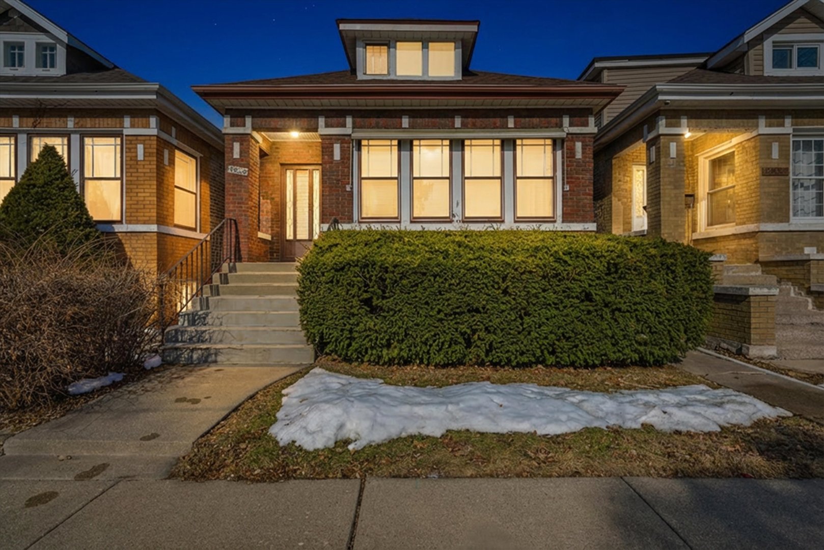 a view of a front of a house with a outdoor space