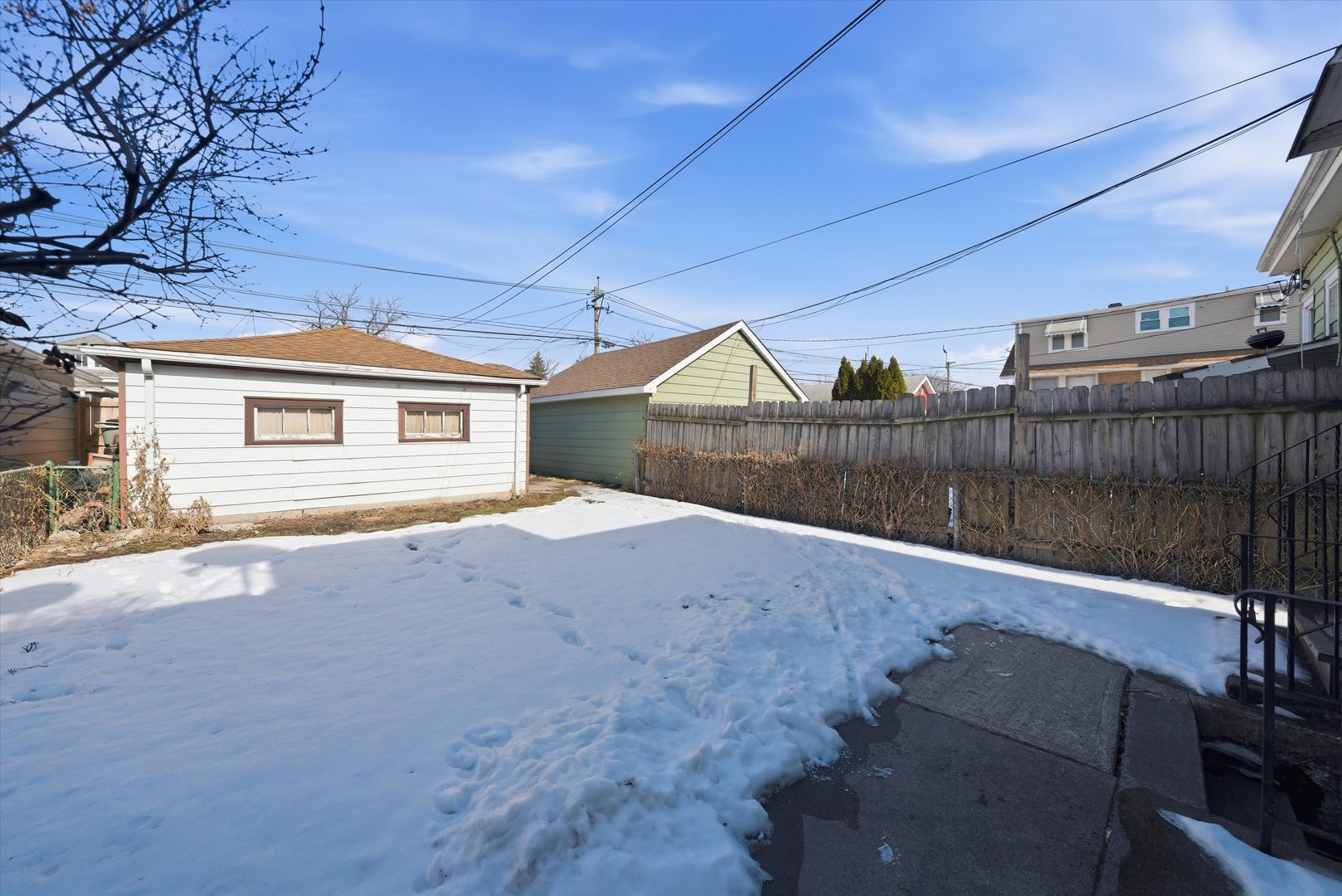 3822 West 64th Street Chicago, IL 60629 - Photo 28 of 33 a view of a house with a backyard